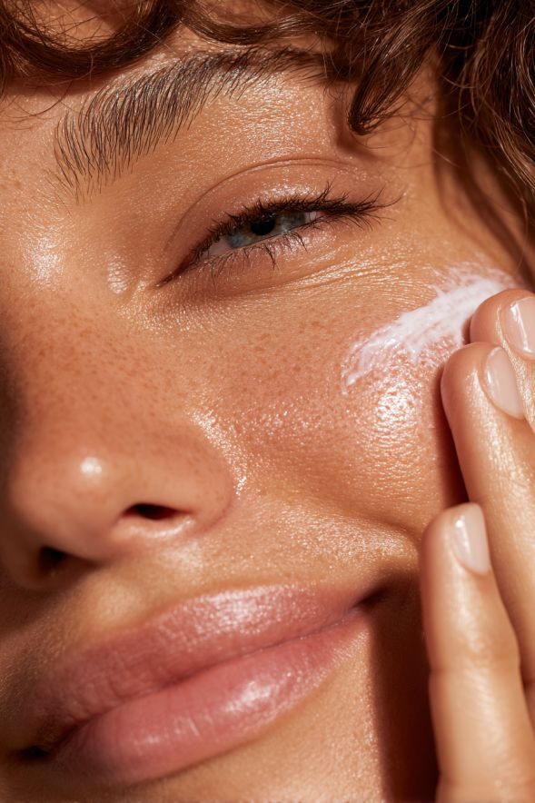 Close-up of skincare being applied